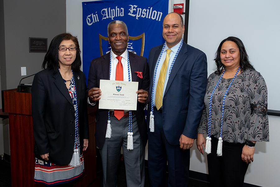 Honorary Inductee Mr. Winston Yarde with QCC VP for Student Affairs Dr. Brian Kerr, Dr. Kyoko Toyama of Chi Alpha Epsilon, and Ms. Francesca Berrouet of CSTEP.