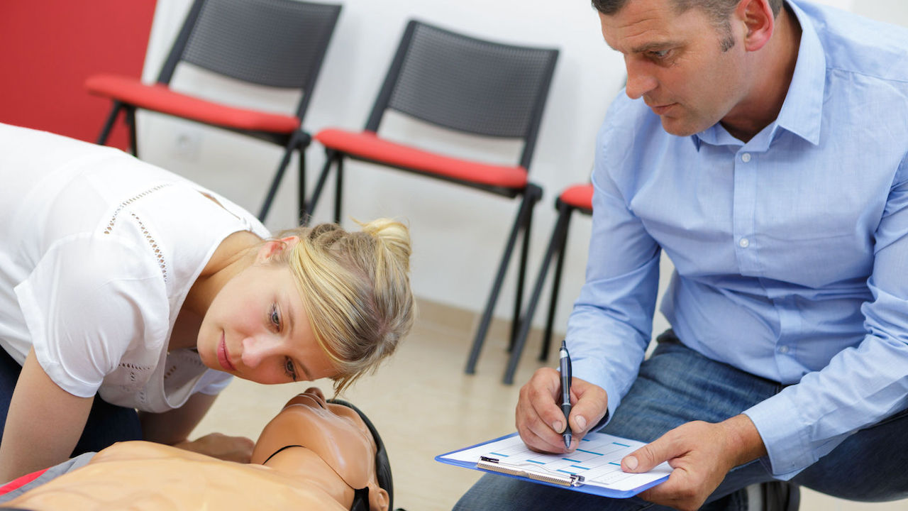 Photo of a student learning CPR