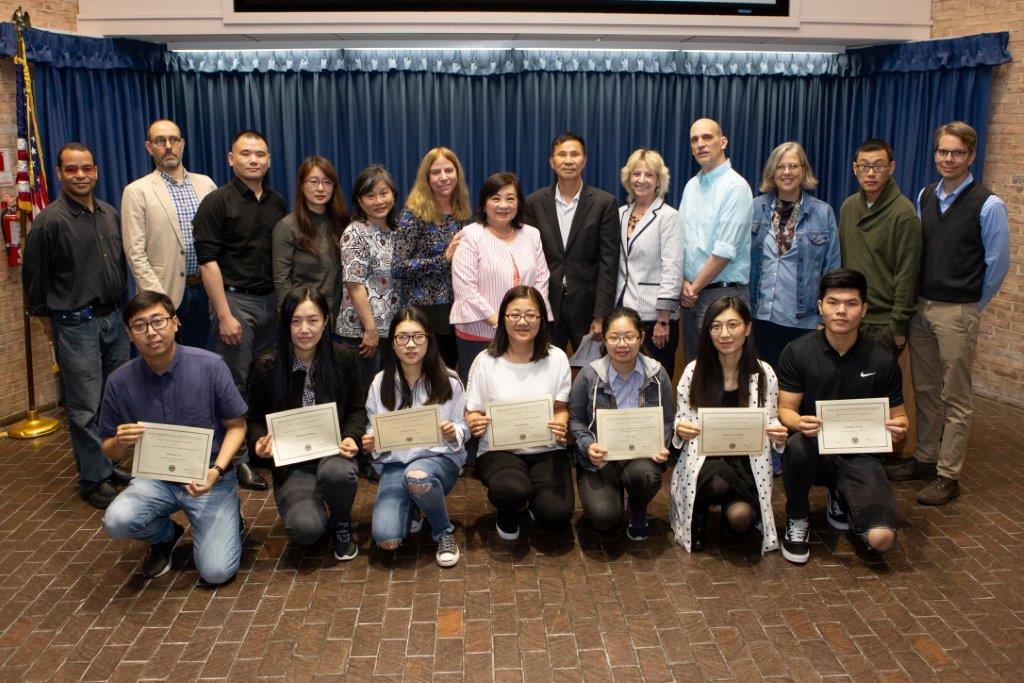 Port of Entry students holding up certificates