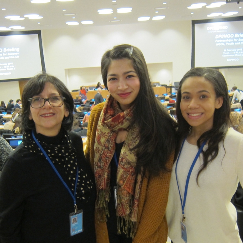 QCC/WCA UN Youth Representatives Soha Farooqui (center) and Miranda Barnes (right) with Professor Liz Di Giorgio
