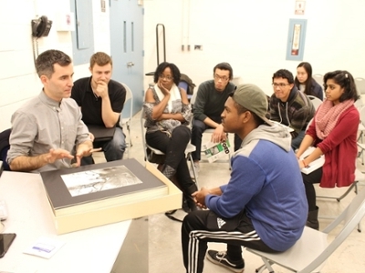 Ramsey and colleagues listen intently to Moakley’s critique