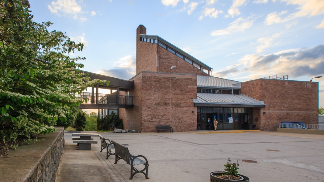 QCC Student Union building entrance on a beautiful spring day
