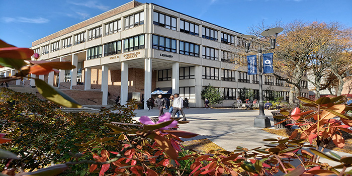 Photo of the front of the library building from the main parking lot.