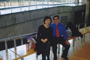 Bruce Montalbano with wife standing by staircase