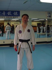 Dr. Shin wearing Taekwondo attire