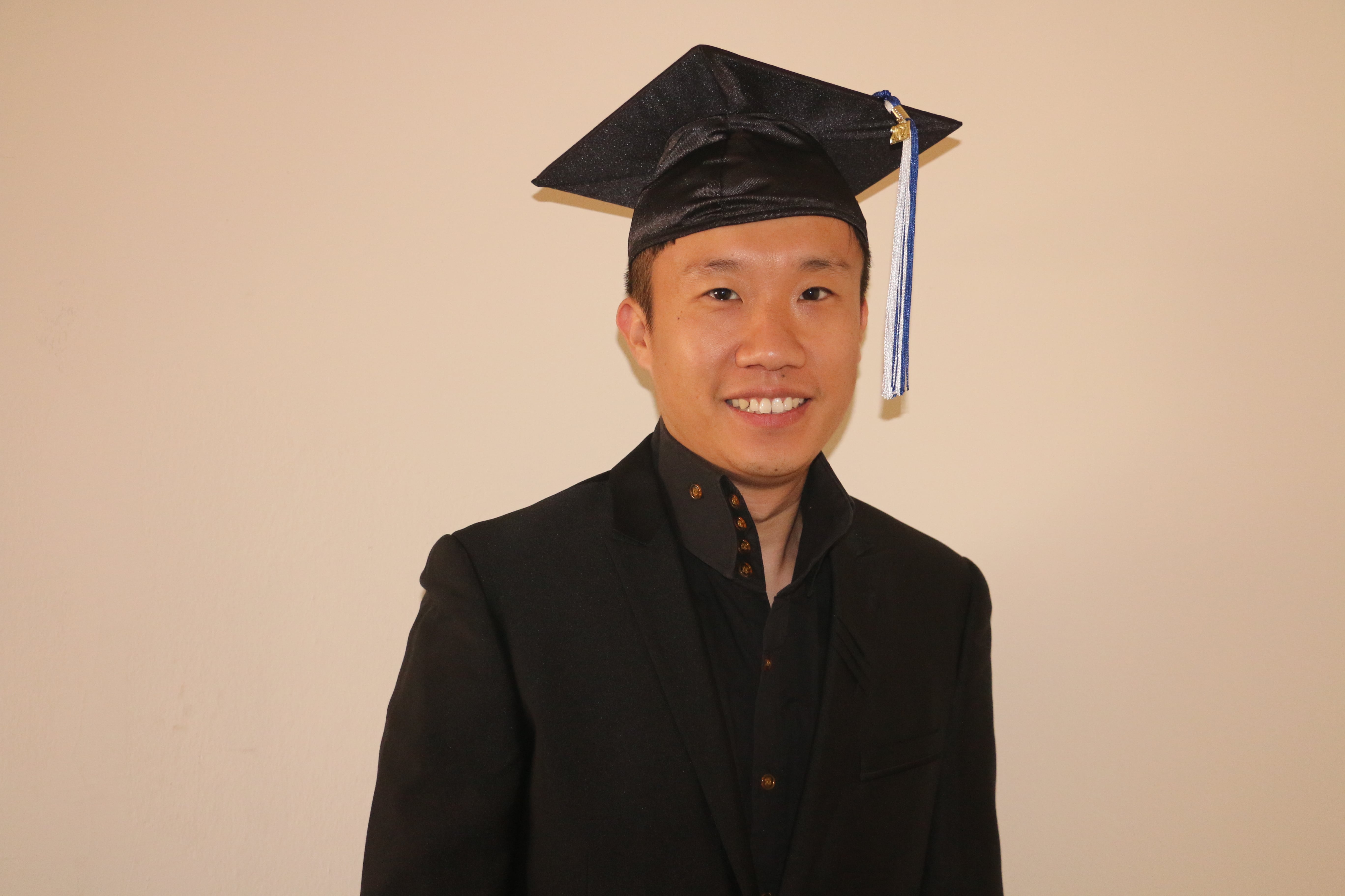 Image of Xin Wang, QCC Commencement 2021