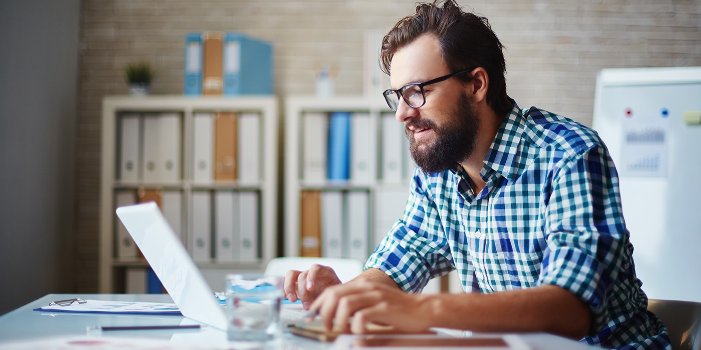 IT specialist working on a laptop