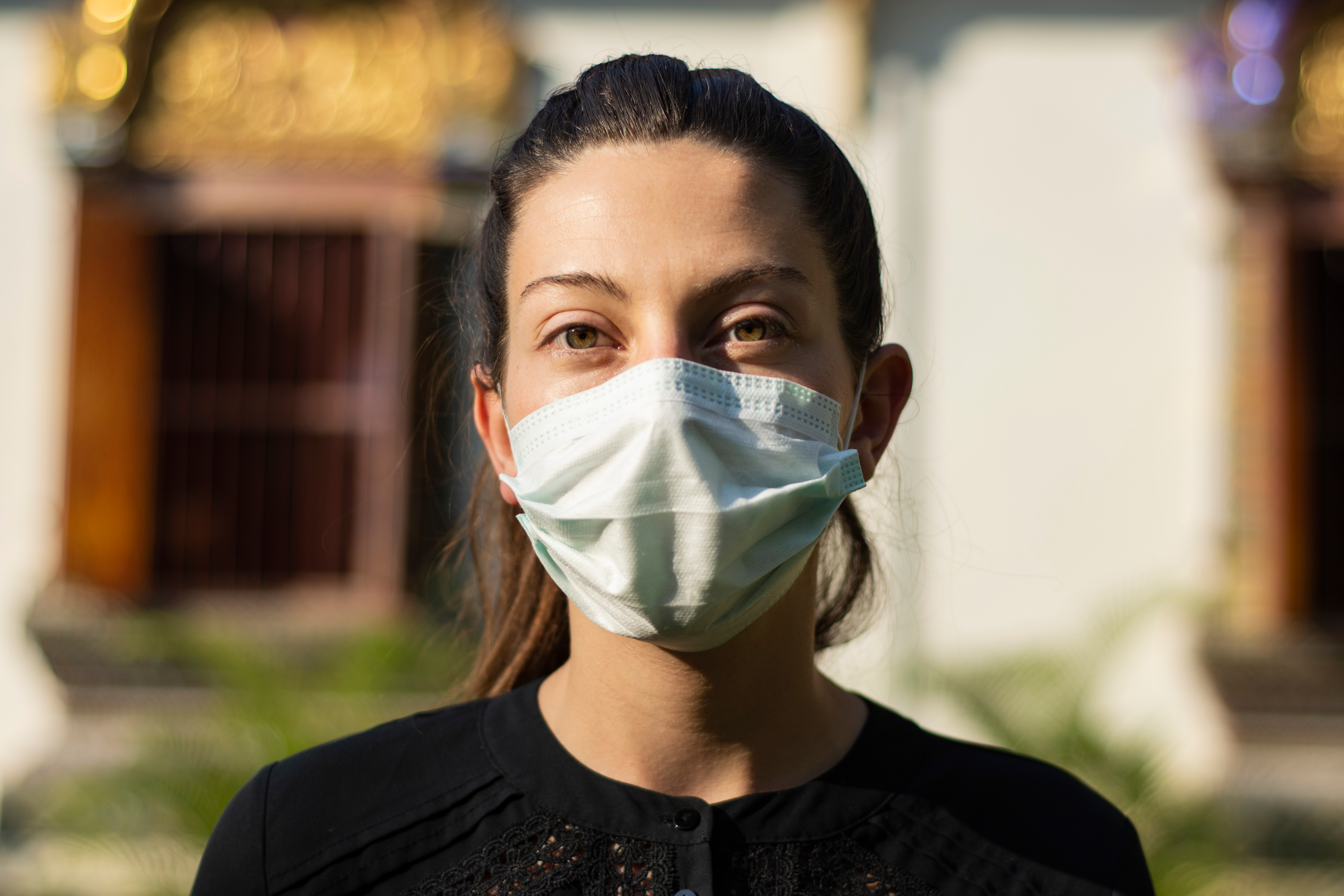 headshot of female wearing a mask