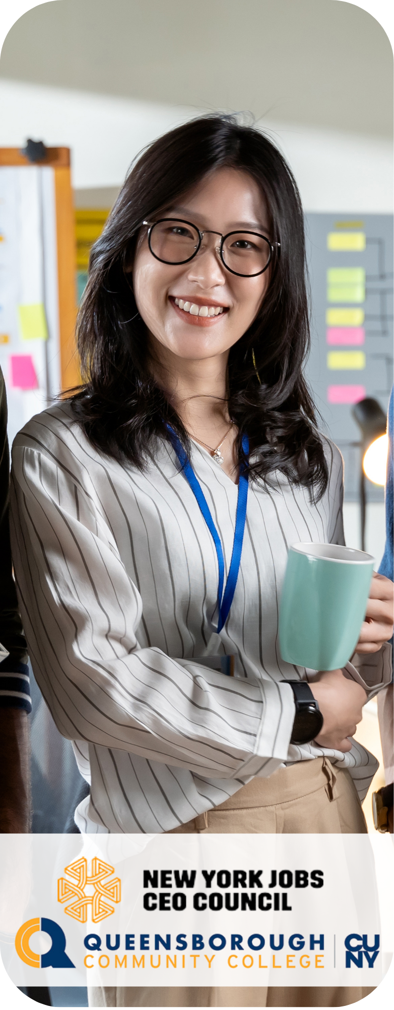 Young women holding a mug on an office.