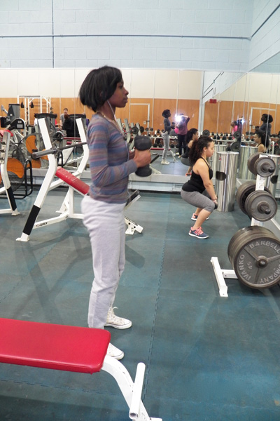 Picture of a QCC student exercising in the Fitness Center