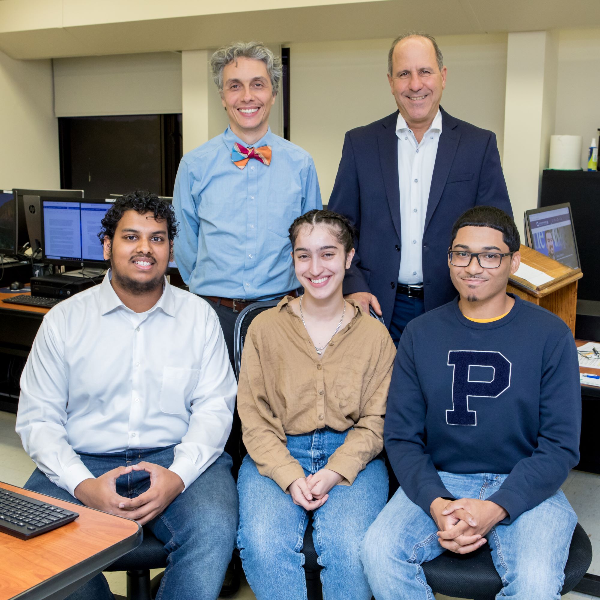 Picture, from left to right: Saif Khan, Dr. Roumen Vragov, Jessica Schuler, Professor S. Benjamin Murolo and Christian Ramjas