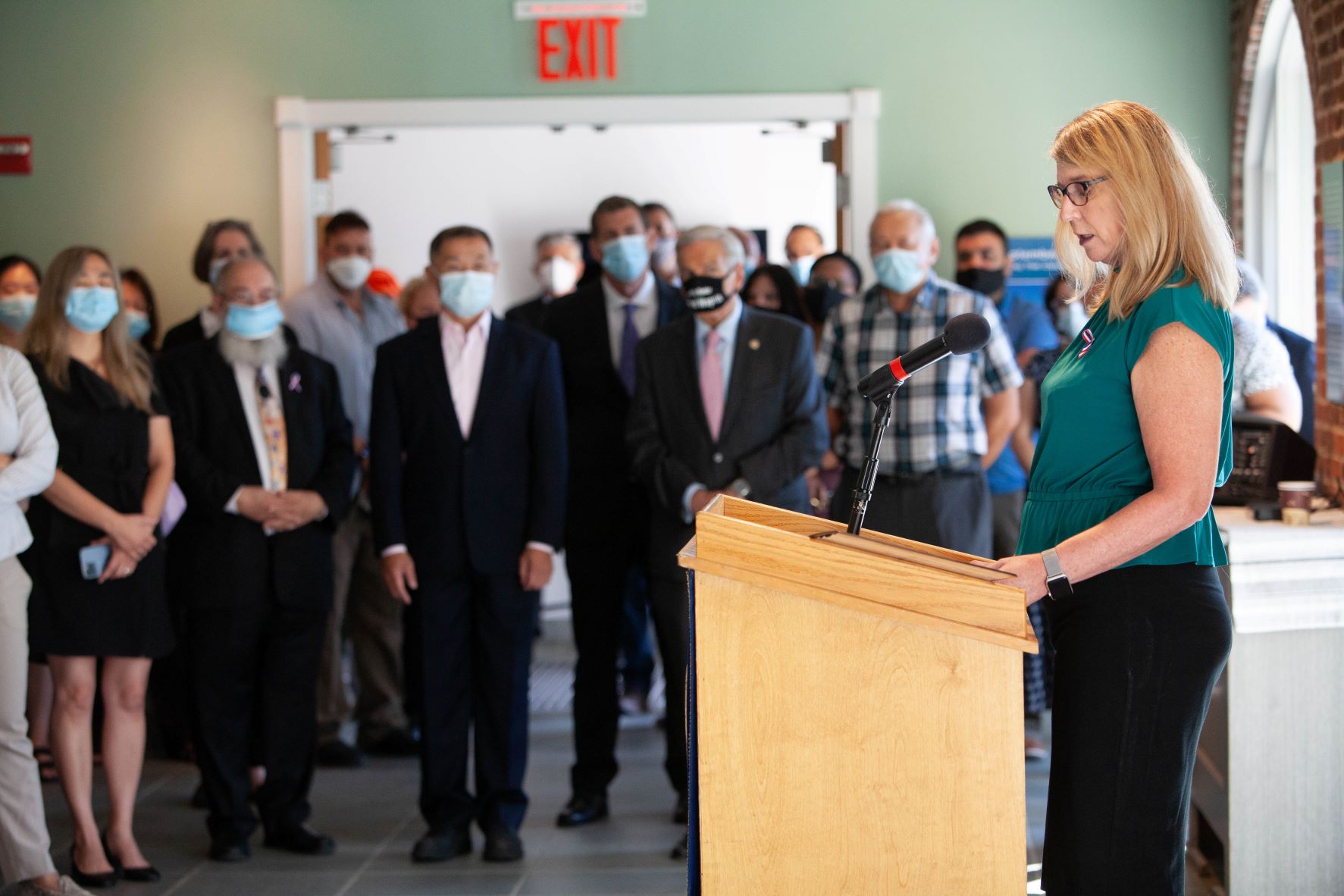 Queensborough Community College President Dr. Christine Mangino welcomes guests to the Qcc Art Gallery