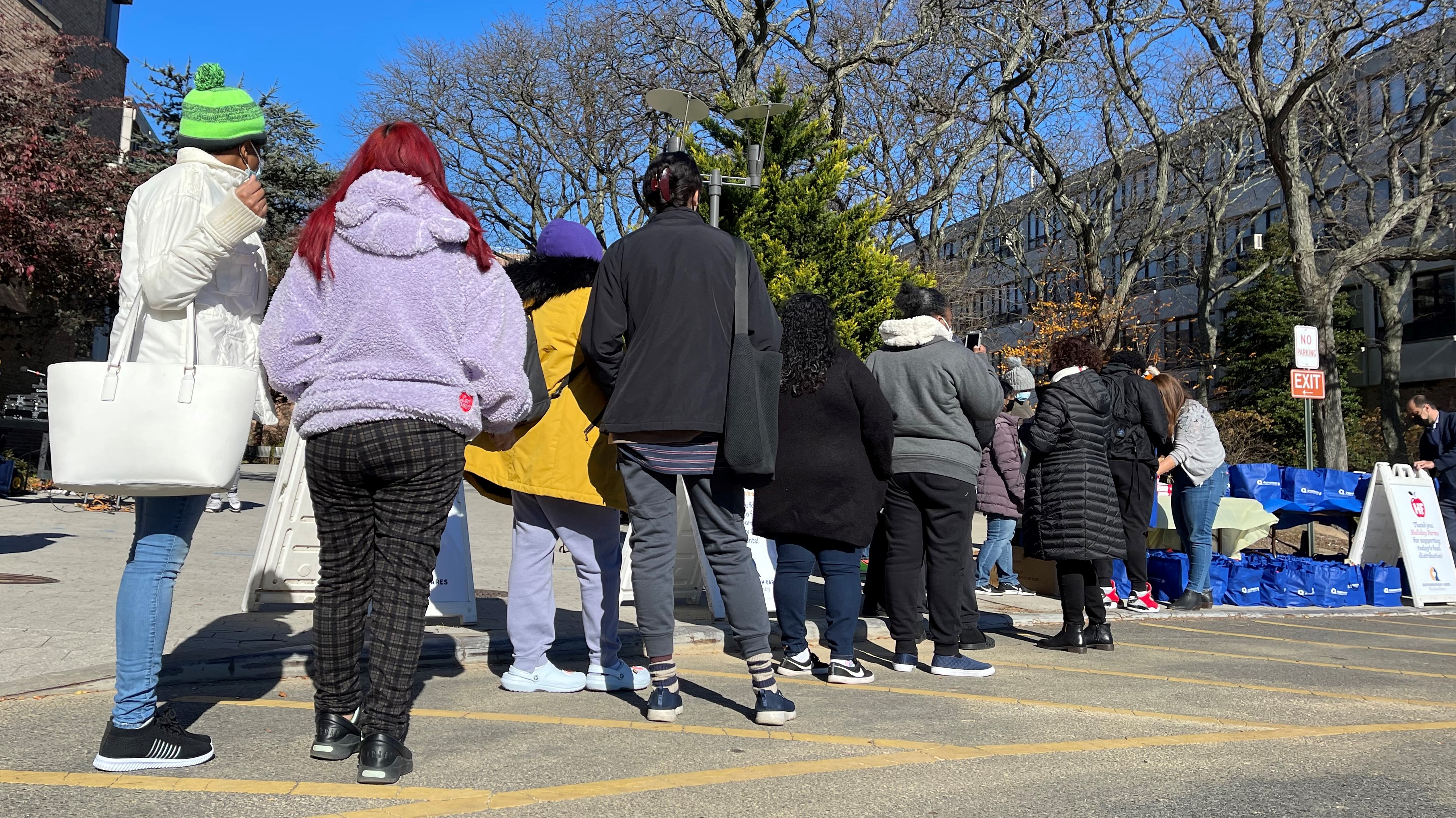 Queensborough students accept generous Thanksgiving donations, including fresh produce and turkeys, from the community and Queensborough Community College’s Food Pantry on Wednesday, November 24