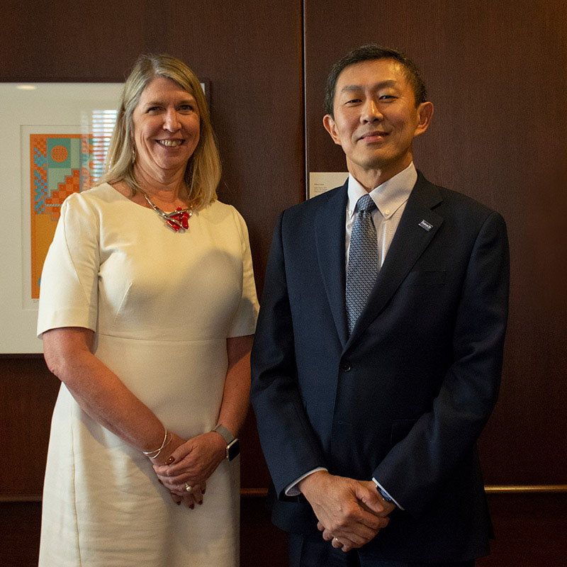 Photo of President Christine Mangino of Queensborough Community College and President S. David Wu of Baruch College
