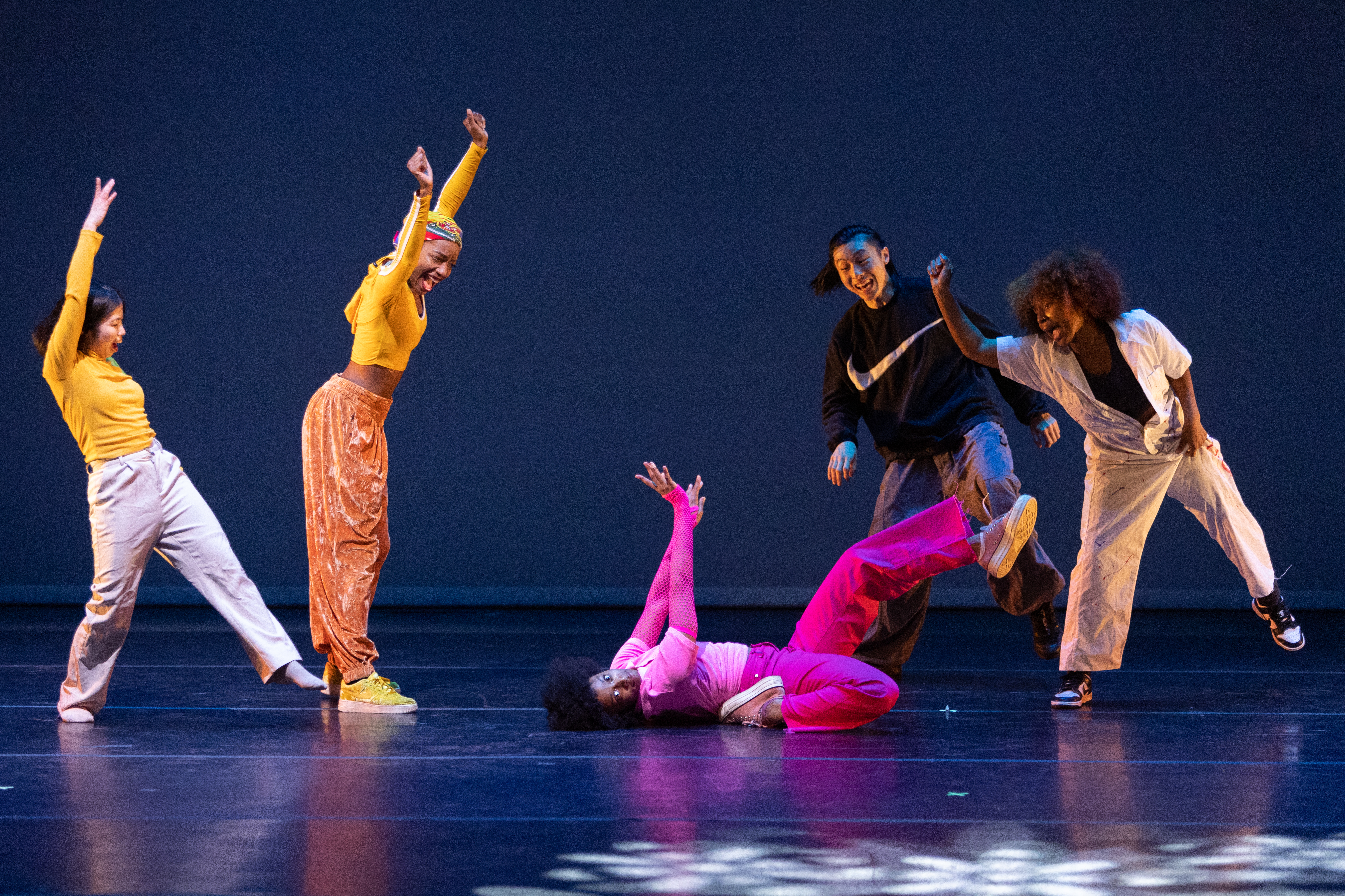 group of female dancers on stage