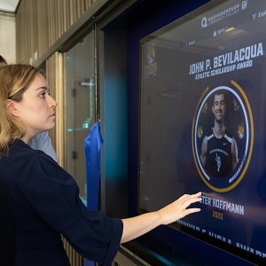 peering at Peter Hoffmann's profile on the Wall of Fame screen