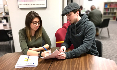 student studying with tutor