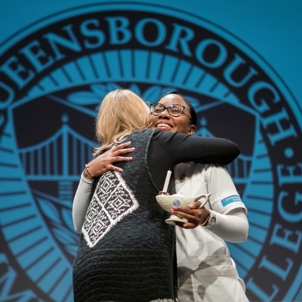 female nursing student hugging Queensborough mentor