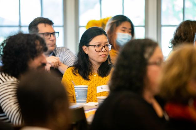 Orientation attendees listen to presentation